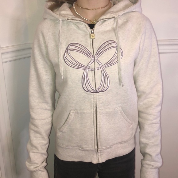 Very light grey TNA zip up with light purple logo - Picture 7 of 11